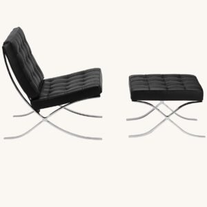 Black Barcelona chair with ottoman in tufted leather on a polished steel X-frame, front view.