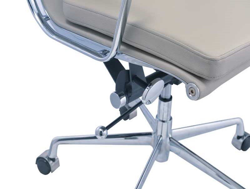 Polished chrome armrest of a light grey EA217 soft pad chair, curved aluminium