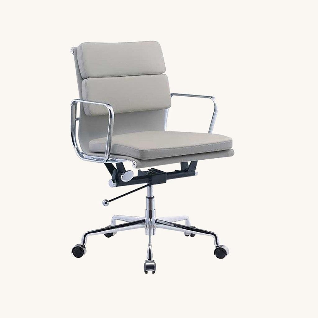 Light grey EA217 soft pad chair in leather on a chrome five-star base, front view.