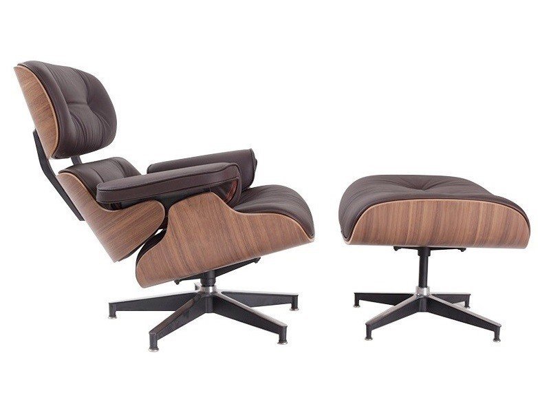 Chocolate brown Eames lounge chair and ottoman, deep brown leather on a walnut shell in a lounge.