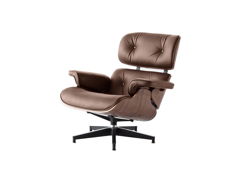 Eames lounge chair in tan leather with a walnut shell and matching ottoman, shown from the front.