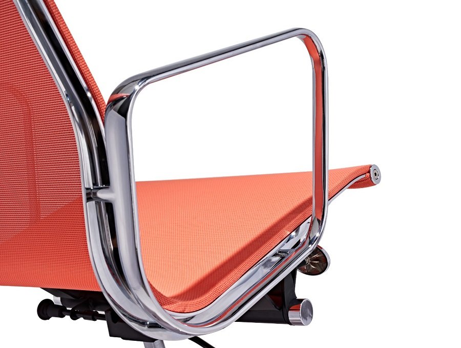 Polished chrome armrest of an orange Eames low-back mesh office chair, curved aluminium arm.