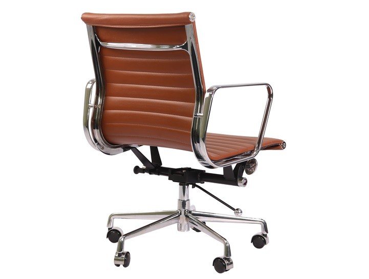 Eames office chair in tan leather seen from the side, low-back ribbed panels on chrome.