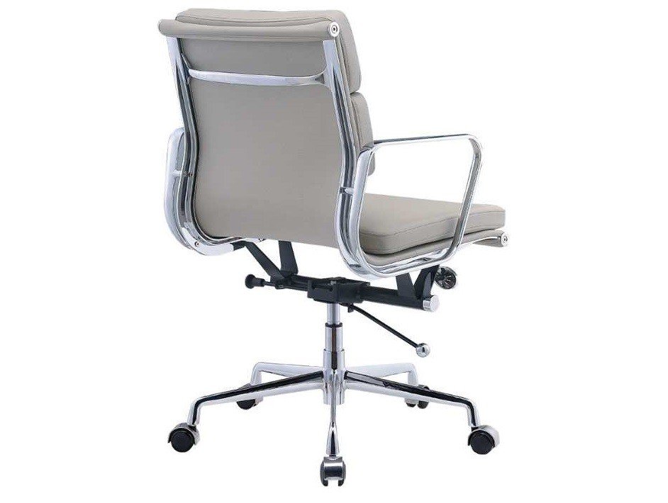 Light grey Eames soft pad chair at an angle, low-back leather cushions on a chrome frame.