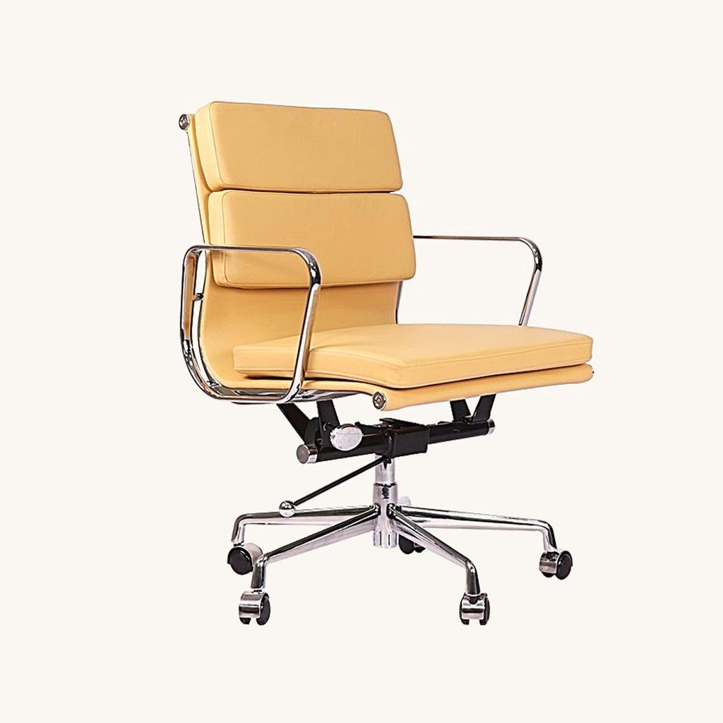 Camel Eames soft pad management chair in leather on a chrome five-star base, front view.
