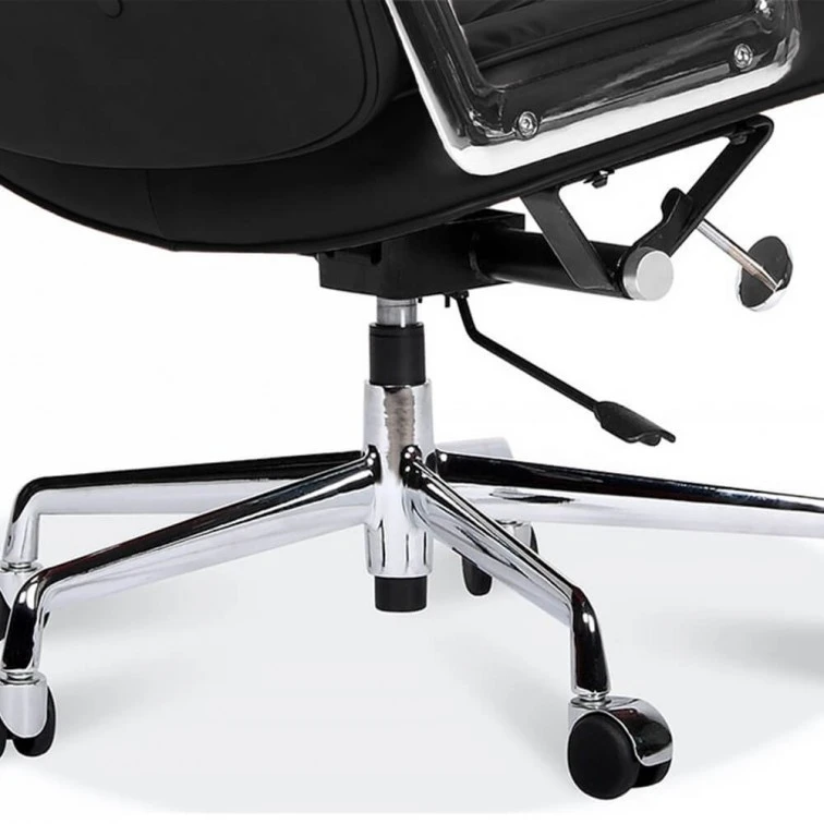 Chrome five-star base and castors of a black Eames style executive chair with gas-lift.