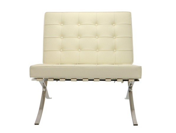 lose-up of the hand-tufted ivory leather on a Barcelona chair, buttoned squares and piping.