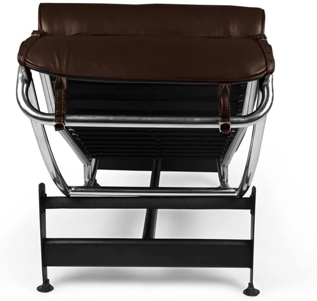 The Le Corbusier LC4 brown cradle glides on the frame, shown set to an upright reading angle. 2