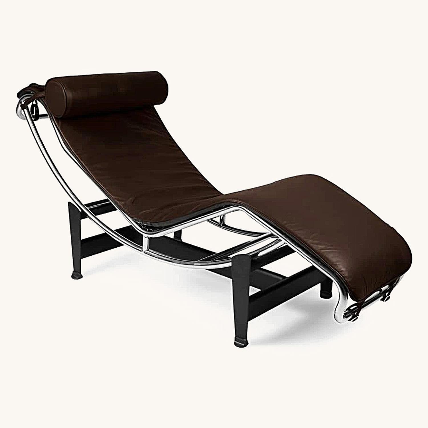 Le Corbusier style LC4 chaise lounge chair in chocolate brown leather on a chrome bow frame, front view.