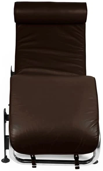 Padded headrest bolster and brown leather seat of a Le Corbusier style LC4 chaise lounge, close-up.