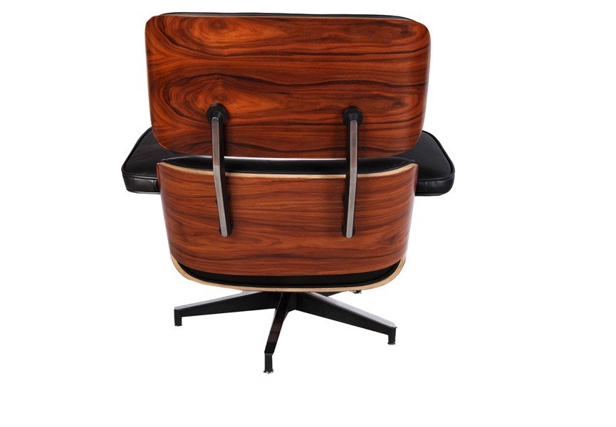 Natural rosewood grain on a vintage-style Eames lounge chair, warm unstained palisander tone.